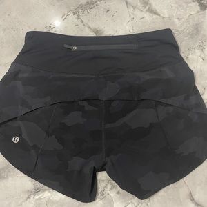 Womens Lululemon Speed Up mid rise 4 inches size 2 Black camo